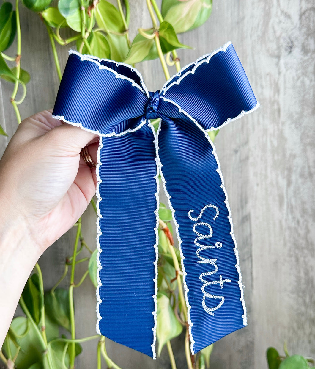 Saints moonstitch bow- Toupelo Crafts