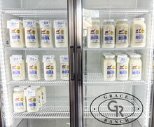 Load image into Gallery viewer, Milk - FRESH IN THE FRIDGE - Grace Ranch 100% Jersey Cows raw milk : 1/2 gallon - pickup only - please return glass jar at your next pickup
