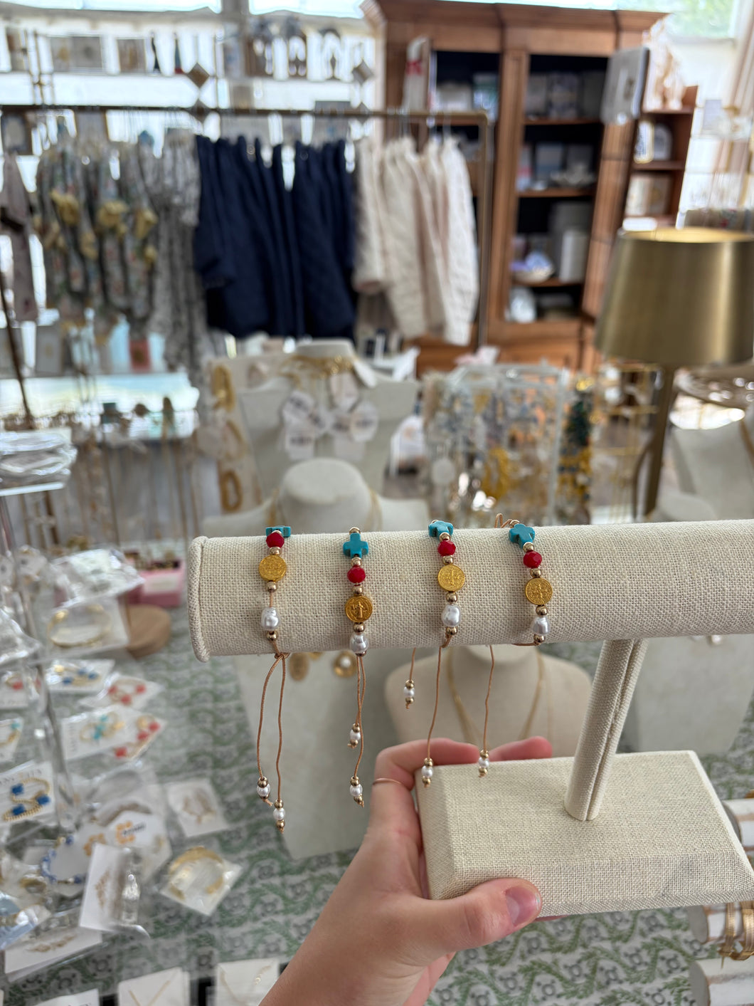 Cross bracelet with red stone- The Gilded Mosquito