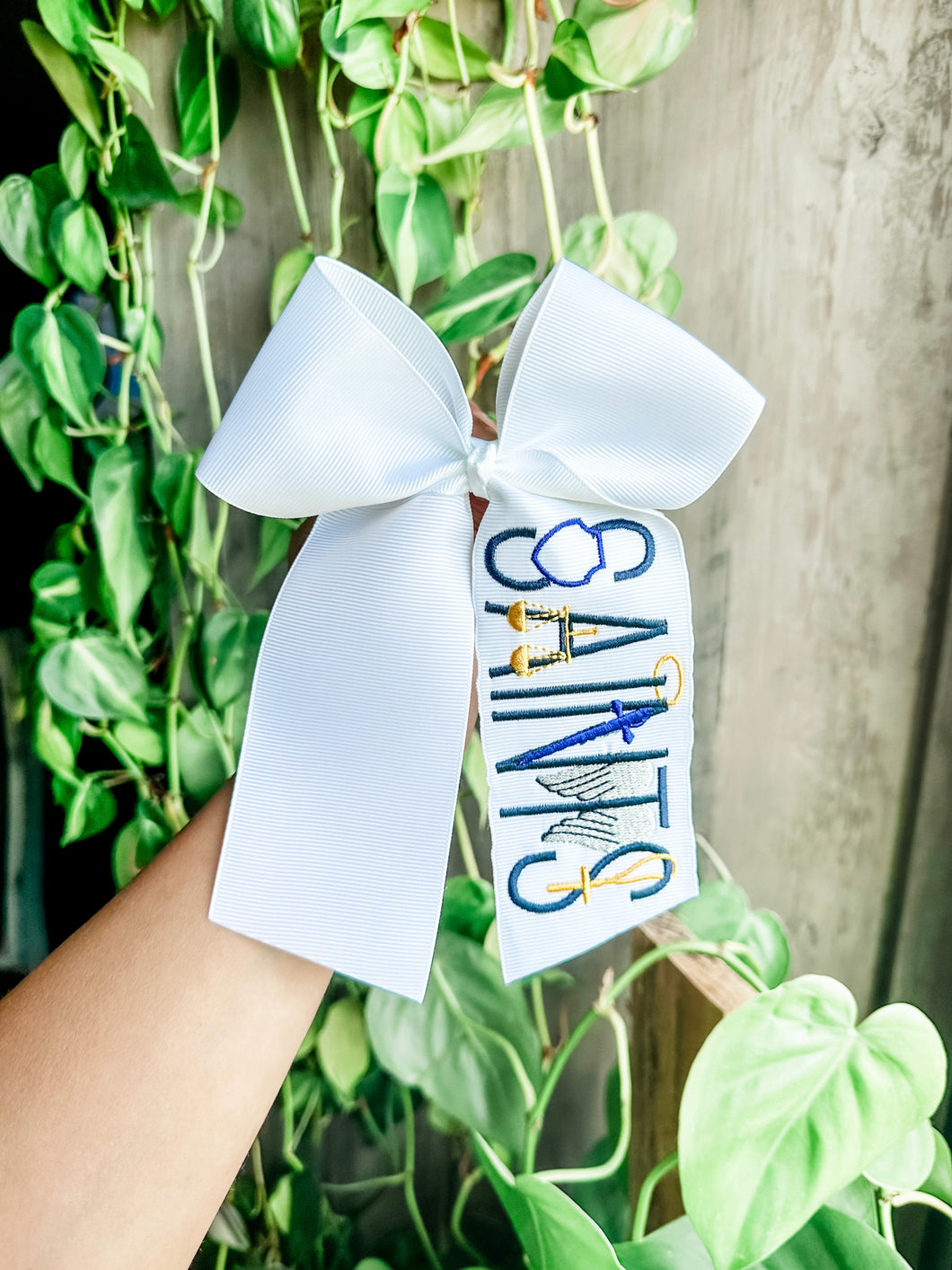 Custom SAINTS bow - Toupelo Crafts