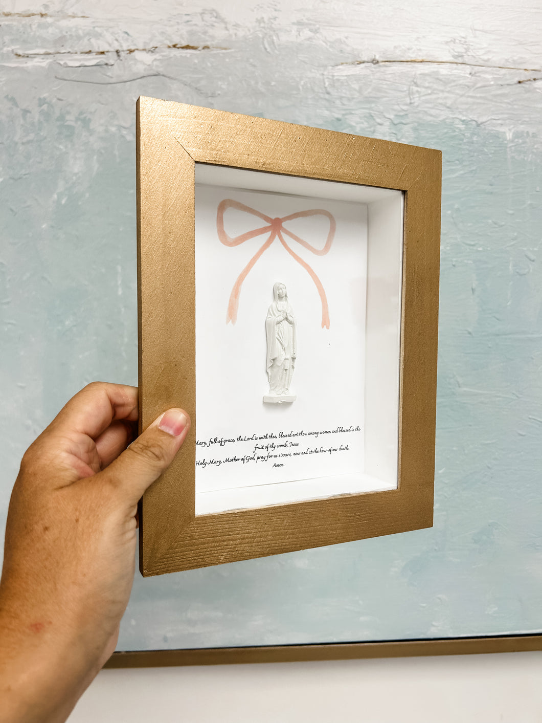 Hail Mary in display case pink cross  - Mary Abraham Collective