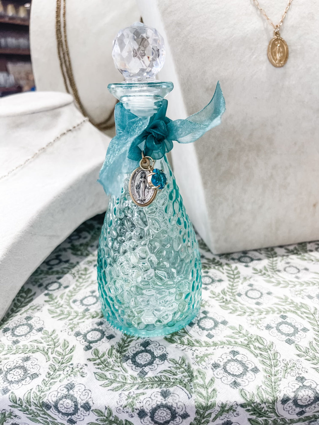 Holy Water Bottle Green Tint Bottle with Teal Sheer Ribbon, Mary and Green Stone- The Gilded Mosquito by Lisa Leger