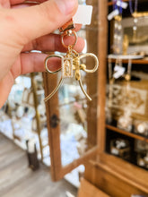 Load image into Gallery viewer, assorted bow clip - Gilded Mosquito by Lisa Leger
