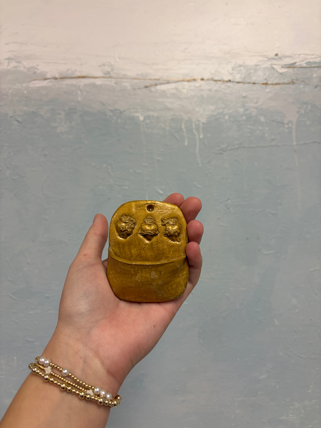 small holy hearts gold water font - Mary Abraham Collective