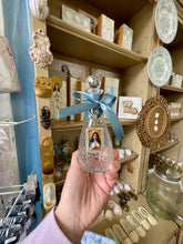 Load image into Gallery viewer, Holy Water Bottle mary holding cross - The Gilded Mosquito by Lisa Leger

