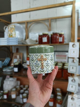 Load image into Gallery viewer, Crucifix on green/blue floral canister- Christina Yeager Designs

