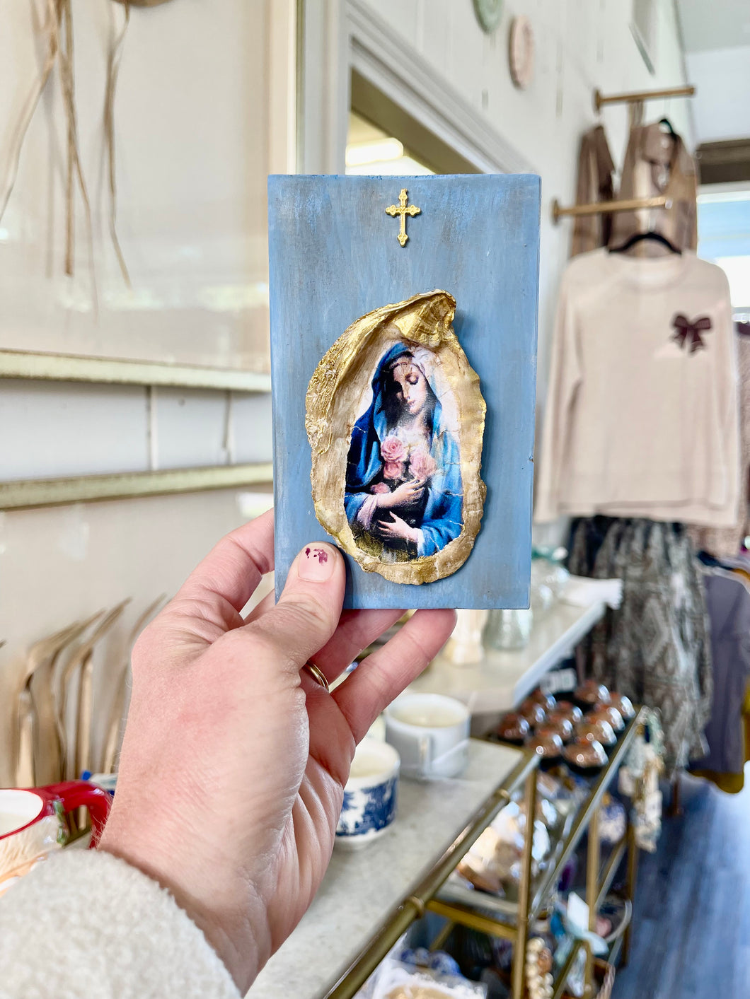 Mary Oyster shell on blue wood- The Gilded Mosquito