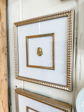Load image into Gallery viewer, 9x9 intaglio in champagne scalloped frame
