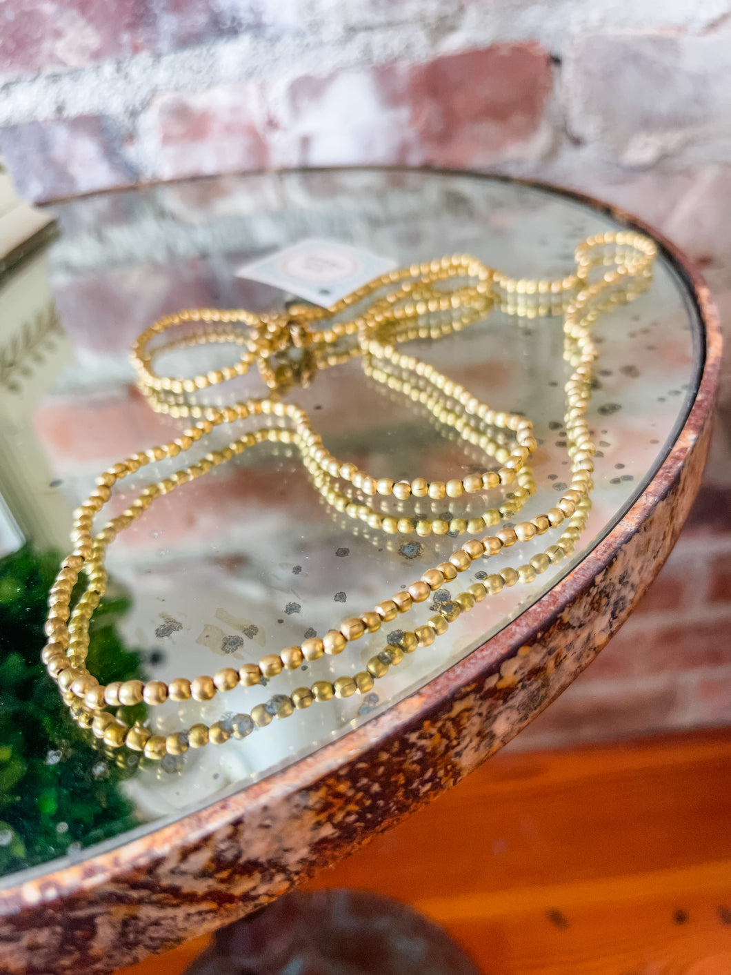 Gold beaded layering necklace