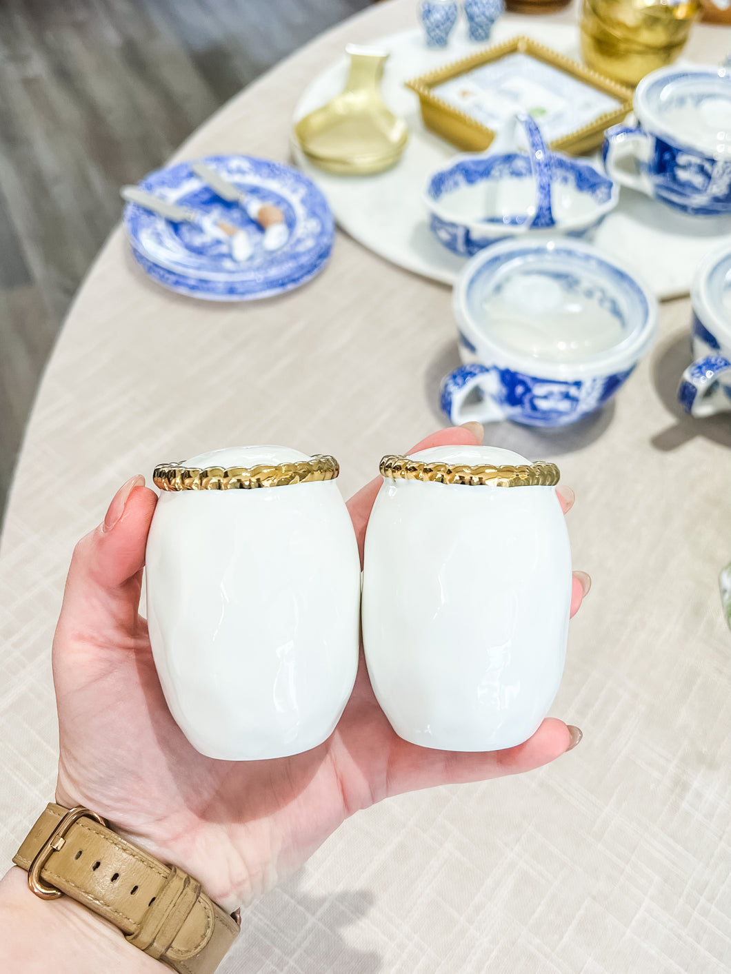 Gold and white salt and pepper shaker set