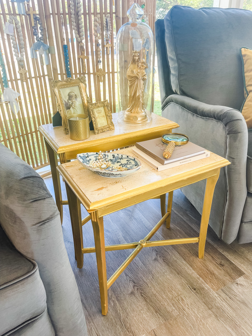 Gold and cream wooden nesting tables